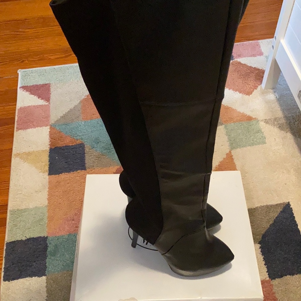 Classic Steven madden black thigh high boots ready for your fall fashion